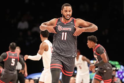 Nov 21, 2022; Brooklyn, New York, USA;  St. John's Red Storm center Joel Soriano (11) celebrates after scoring in the first half against the Temple Owls at Barclays Center. Mandatory Credit: Wendell Cruz-USA TODAY Sports