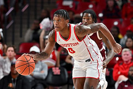 Nov 16, 2022; Houston, Texas, USA; Houston Cougars guard Marcus Sasser (0) brings the ball up court during the first half against the Texas Southern Tigers at Fertitta Center. Mandatory Credit: Maria Lysaker-USA TODAY Sports