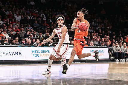 Nov 22, 2022; Brooklyn, New York, USA;  Syracuse Orange guard Judah Mintz (3) drives past St. John's Red Storm guard Andre Curbelo (3) in the first half at Barclays Center. Mandatory Credit: Wendell Cruz-USA TODAY Sports