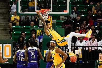 Nov 23, 2022; Waco, Texas, USA;  Baylor Bears forward Jalen Bridges (11) dunks the ball against the McNeese State Cowboys during the first half at Ferrell Center. Mandatory Credit: Chris Jones-USA TODAY Sports