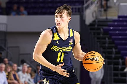Nov 23, 2022; Fort Myers, Florida, USA;  Marquette Golden Eagles guard Tyler Kolek (11) controls the ball against the Georgia Tech Yellow Jackets in the first half during the Fort Myers Tip-Off Beach Division third place game at Suncoast Credit Union Arena. Mandatory Credit: Nathan Ray Seebeck-USA TODAY Sports