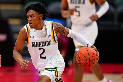 Nov 24, 2022; Orlando, FL, USA; Siena Saints guard Javian McCollum (2) drives towards the basket against the Florida State Seminoles during the second half at ESPN Wide World of Sports. Mandatory Credit: Rich Storry-USA TODAY Sports