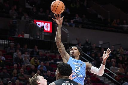 Nov 24, 2022; Portland, Oregon, USA; North Carolina Tar Heels guard Caleb Love (2) puts a shot up during the second half against the Portland Pilots at Moda Center. North Carolina won the game 89-81. Mandatory Credit: Troy Wayrynen-USA TODAY Sports
