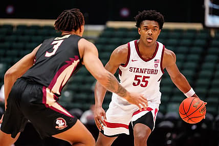 Nov 25, 2022; Orlando, FL, USA; Stanford Cardinal forward Harrison Ingram (55) dribbles the ball up the court against the Florida State Seminoles during the first half at ESPN Wide World of Sports. Mandatory Credit: Rich Storry-USA TODAY Sports