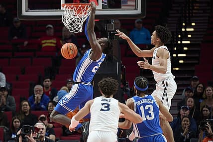 Nov 25, 2022; Portland, Oregon, USA; Duke Blue Devils forward Mark Mitchell (25) dunks the basketball during the first half against the Xavier Musketeers at Moda Center. Mandatory Credit: Troy Wayrynen-USA TODAY Sports