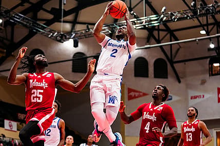 Nov 25, 2022; Orlando, FL, USA; Memphis Tigers guard Alex Lomax (2) shoots against Nebraska Cornhuskers guard Emmanuel Bandoumel (25) during the second half  at ESPN Wide World of Sports. Mandatory Credit: Rich Storry-USA TODAY Sports