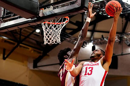 Nov 27, 2022; Orlando, FL, USA; Nebraska Cornhuskers forward Derrick Walker (13) shoots against Florida State Seminoles center Naheem McLeod (24) during the second half at ESPN Wide World of Sports. Mandatory Credit: Rich Storry-USA TODAY Sports