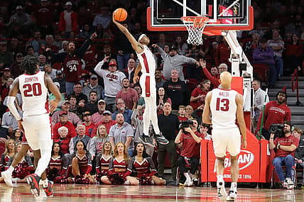 Nov 28, 2022; Fayetteville, Arkansas, USA; Arkansas Razorbacks guard Ricky Council IV (1) dunks the ball in the first half against the Troy Trojans at Bud Walton Arena. Mandatory Credit: Nelson Chenault-USA TODAY Sports