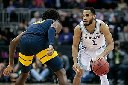 Mar 9, 2022; Kansas City, MO, USA;  Kansas State Wildcats guard Markquis Nowell (1) sets the play against the West Virginia Mountaineers at T-Mobile Center. Mandatory Credit: William Purnell-USA TODAY Sports