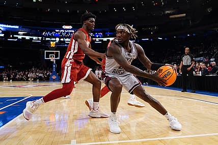 Mar 29, 2022; New York, New York, USA; Texas A&M Aggies guard Manny Obaseki (35) looks to make a move against Washington State Cougars guard TJ Bamba (5) during the second half of the NIT college basketball semifinals at Madison Square Garden. Mandatory Credit: Gregory Fisher-USA TODAY Sports