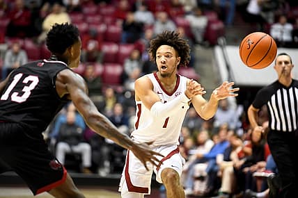 Nov 18, 2022; Tuscaloosa, AL, USA;  Alabama guard Mark Sears (1) passes the ball to the corner with Jacksonville State guard Peyton Daniels (13) defending at Coleman Coliseum.

Ncaa Basketball Alabama Vs Jacksonville State Men S Basketball