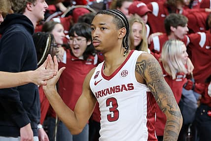 Nov 28, 2022; Fayetteville, Arkansas, USA; Arkansas Razorbacks guard Nick Smith Jr (3) celebrates with fans after the game against the Troy Trojans at Bud Walton Arena. Arkansas won 74-61. Mandatory Credit: Nelson Chenault-USA TODAY Sports