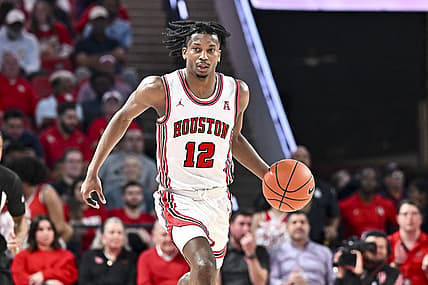 Nov 29, 2022; Houston, Texas, USA; Houston Cougars guard Tramon Mark (12) dribbles the ball during the second half against the Norfolk State Spartans at Fertitta Center. Mandatory Credit: Maria Lysaker-USA TODAY Sports