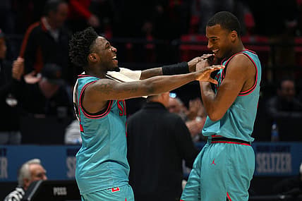 Nov 29, 2022; San Diego, California, USA; San Diego State Aztecs guard Darrion Trammell (left) and guard Micah Parrish (right) celebrate after defeating the UC Irvine Anteaters at Viejas Arena. Mandatory Credit: Orlando Ramirez-USA TODAY Sports