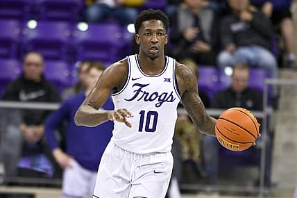 Nov 30, 2022; Fort Worth, Texas, USA; TCU Horned Frogs guard Damion Baugh (10) brings the ball up court against the Providence Friars during the first half at Ed and Rae Schollmaier Arena. Mandatory Credit: Jerome Miron-USA TODAY Sports