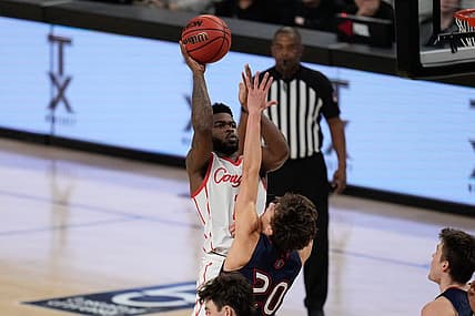 Dec 3, 2022; Fort Worth, Texas, USA;  Houston Cougars guard Jamal Shead (1) makes a shot over St. Mary's Gaels guard Aidan Mahaney (20) during the second half at Dickies Arena. Mandatory Credit: Chris Jones-USA TODAY Sports