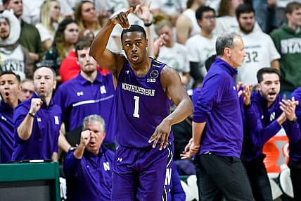Northwestern's Chase Audige celebrates after a 3-pointer against Michigan State during the second half on Sunday, Dec. 4, 2022, in East Lansing.

221204 Msu Northwestern Bball 124a