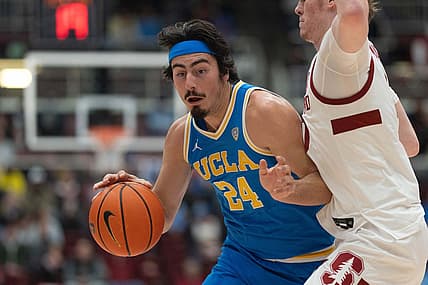 Dec 1, 2022; Stanford, California, USA;  UCLA Bruins guard Jaime Jaquez Jr. (24) drives the ball around Stanford Cardinal forward Max Murrell (10) during the first half at Maples Pavilion. Mandatory Credit: Stan Szeto-USA TODAY Sports