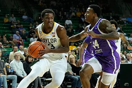 Dec 6, 2022; Waco, Texas, USA;  Baylor Bears guard Dale Bonner (3) drives to the basket against Tarleton Texans guard Javontae Hopkins (14) during the first half at Ferrell Center. Mandatory Credit: Chris Jones-USA TODAY Sports