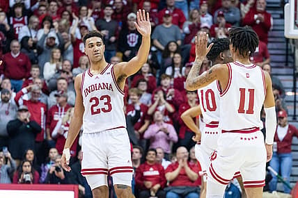 Dec 7, 2022; Bloomington, Indiana, USA; Indiana Hoosiers forward Trayce Jackson-Davis (23) celebrates the third ever triple double in Indiana Hoosiers history with teammates in the second half against the Nebraska Cornhuskers at Simon Skjodt Assembly Hall. Mandatory Credit: Trevor Ruszkowski-USA TODAY Sports