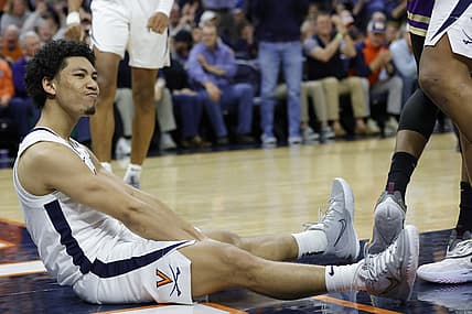Dec 6, 2022; Charlottesville, Virginia, USA; Virginia Cavaliers guard Kihei Clark (0) reacts after scoring while being fouled James Madison Dukes in the second half at John Paul Jones Arena. Mandatory Credit: Geoff Burke-USA TODAY Sports