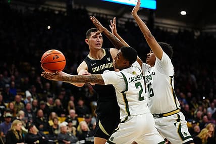 Dec 8, 2022; Boulder, Colorado, USA; Colorado State Rams guard Taviontae Jackson (2) and Colorado State Rams guard Jalen Lake (15) defend on Colorado Buffaloes guard Luke O'Brien (0) in the first half at the CU Events Center. Mandatory Credit: Ron Chenoy-USA TODAY Sports
