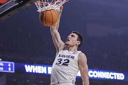 Dec 10, 2022; Cincinnati, Ohio, USA; Xavier Musketeers forward Zach Freemantle (32) dunks on the Cincinnati Bearcats in the first half at Fifth Third Arena. Mandatory Credit: Katie Stratman-USA TODAY Sports