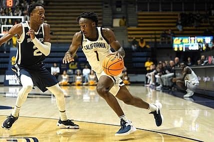 Dec 10, 2022; Berkeley, California, USA; California Golden Bears guard Joel Brown (1) dribbles against Butler Bulldogs guard Eric Hunter Jr. (2) during the second half at Haas Pavilion. Mandatory Credit: Darren Yamashita-USA TODAY Sports