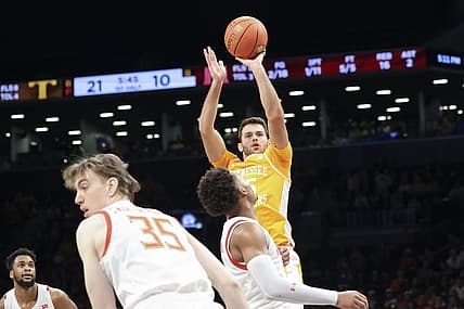 Dec 11, 2022; Brooklyn, New York, USA; Tennessee Volunteers guard Santiago Vescovi (25) shoots against the Maryland Terrapins during the first half at Barclays Center. Mandatory Credit: Jessica Alcheh-USA TODAY Sports