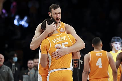 Dec 11, 2022; Brooklyn, New York, USA; Tennessee Volunteers forward Uros Plavsic (33) embraces Tennessee Volunteers guard Santiago Vescovi (25) after the Tennessee Volunteers defeat the Maryland Terrapins 56-53 at Barclays Center. Mandatory Credit: Jessica Alcheh-USA TODAY Sports