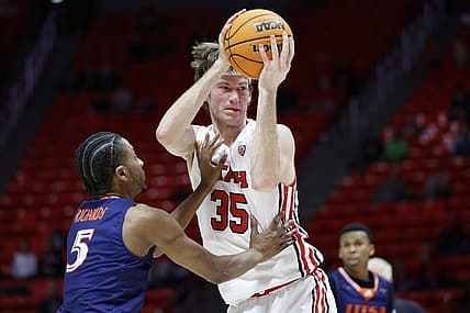 Dec 13, 2022; Salt Lake City, Utah, USA; Utah Utes center Branden Carlson (35) looks to shoot against Texas-San Antonio Roadrunners guard DJ Richards (5) in the second half at Jon M. Huntsman Center. Mandatory Credit: Jeffrey Swinger-USA TODAY Sports