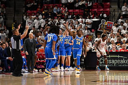 Dec 14, 2022; College Park, Maryland, USA; UCLA Bruins guard David Singleton (34) reacts after making a three point shot during the second half  against the Maryland Terrapins at Xfinity Center. Mandatory Credit: Tommy Gilligan-USA TODAY Sports