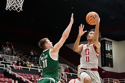 Dec 16, 2022; Stanford, California, USA; Stanford Cardinal guard Ryan Agarwal (11) shoots the basketball against Green Bay Phoenix forward Cade Meyer (11) during the first half at Maples Pavilion. Mandatory Credit: Robert Edwards-USA TODAY Sports