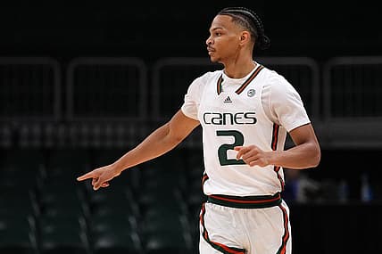 Dec 17, 2022; Coral Gables, Florida, USA; Miami Hurricanes guard Isaiah Wong (2) gestures while running up the court during the first half against the St. Francis Red Flash at Watsco Center. Mandatory Credit: Jasen Vinlove-USA TODAY Sports