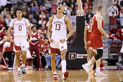 Dec 17, 2022; North Little Rock, Arkansas, USA; Arkansas Razorbacks guard Jordan Walsh (13) celebrates after scoring in the first half against the Bradley Braves at Simmons Bank Arena. Mandatory Credit: Nelson Chenault-USA TODAY Sports