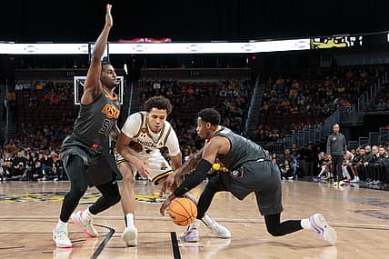 Dec 17, 2022; Wichita, Kansas, USA; Wichita State Shockers guard Craig Porter Jr. (3) goes after a loose ball during the first half against the Oklahoma State Cowboys at INTRUST Bank Arena. Mandatory Credit: William Purnell-USA TODAY Sports