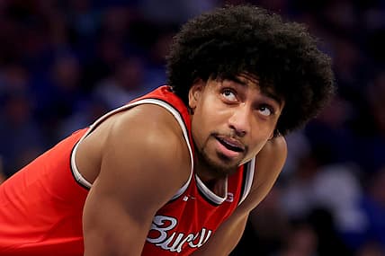 Dec 17, 2022; New York, New York, USA; Ohio State Buckeyes forward Justice Sueing (14) reacts during overtime against the North Carolina Tar Heels at Madison Square Garden. Mandatory Credit: Brad Penner-USA TODAY Sports