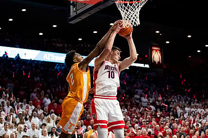 Dec 17, 2022; Tucson, Arizona, USA; Arizona Wildcats forward Azuolas Tubelis (10) grabs a rebound against Tennessee Volunteers forward Julian Phillips (2) during the first half at McKale Center. Mandatory Credit: Zachary BonDurant-USA TODAY Sports