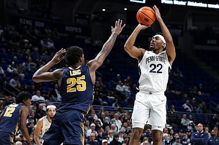 Dec 18, 2022; University Park, Pennsylvania, USA; Penn State Nittany Lions guard Jalen Pickett (22) shoots the ball as Canisius Golden Griffins guard Xzavier Long (25) defends during the first half at Bryce Jordan Center. Penn State defeated Canisius 97-67. Mandatory Credit: Matthew OHaren-USA TODAY Sports