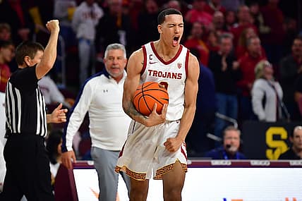 Dec 18, 2022; Los Angeles, California, USA; Southern California Trojans forward Kobe Johnson (0) reacts after drawing the foul against the Auburn Tigers during the second half at Galen Center. Mandatory Credit: Gary A. Vasquez-USA TODAY Sports