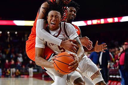 Dec 18, 2022; Los Angeles, California, USA; Southern California Trojans guard Boogie Ellis (5) is fouled by Auburn Tigers forward Johni Broome (4) during the second half at Galen Center. Mandatory Credit: Gary A. Vasquez-USA TODAY Sports