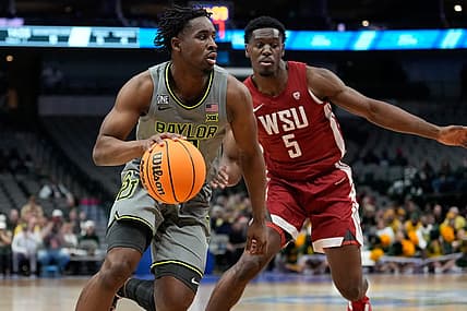 Dec 18, 2022; Dallas, Texas, USA;  Baylor Bears guard Adam Flagler (10) drives to the basket past Washington State Cougars guard TJ Bamba (5) during the first half at American Airlines Center. Mandatory Credit: Chris Jones-USA TODAY Sports