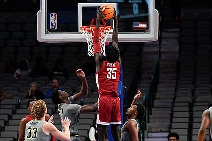 Dec 18, 2022; Dallas, Texas, USA; Washington State Cougars forward Mouhamed Gueye (35) dunks the bal over Baylor Bears forward Josh Ojianwuna (15) during the second half at American Airlines Center. Mandatory Credit: Chris Jones-USA TODAY Sports