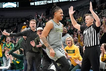 Dec 18, 2022; Dallas, Texas, USA; Baylor Bears guard Keyonte George (1) celebrates with fans after making a three point basket against the Washington State Cougars during the second half at American Airlines Center. Mandatory Credit: Chris Jones-USA TODAY Sports