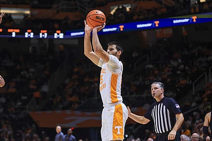 Dec 21, 2022; Knoxville, Tennessee, USA; Tennessee Volunteers guard Santiago Vescovi (25) shoots a three pointer against the Austin Peay Governors at Thompson-Boling Arena. Mandatory Credit: Randy Sartin-USA TODAY Sports