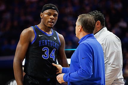 Dec 21, 2022; Lexington, Kentucky, USA; Kentucky Wildcats forward Oscar Tshiebwe (34) talks with head coach John Calipari during the first half against the Florida A&M Rattlers at Rupp Arena at Central Bank Center. Mandatory Credit: Jordan Prather-USA TODAY Sports