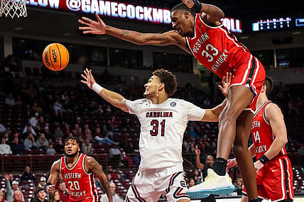 Dec 22, 2022; Columbia, South Carolina, USA; South Carolina Gamecocks forward Benjamin Bosmans-Verdonk (31) and Western Kentucky Hilltoppers center Jamarion Sharp (33) battle for a rebound in the first half at Colonial Life Arena. Mandatory Credit: Jeff Blake-USA TODAY Sports