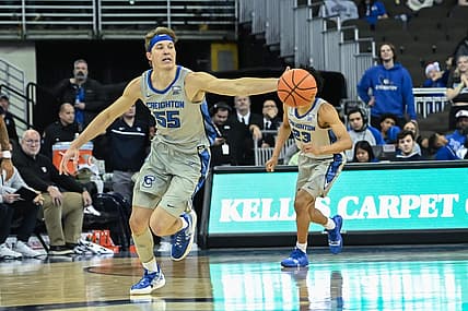 Dec 22, 2022; Omaha, Nebraska, USA;  Creighton Bluejays guard Baylor Scheierman (55) reaches for a loose ball against the Butler Bulldogs in the second half at CHI Health Center Omaha. Mandatory Credit: Steven Branscombe-USA TODAY Sports