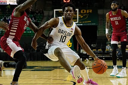 Dec 28, 2022; Waco, Texas, USA;  Baylor Bears guard Adam Flagler (10) drives to the basket against the Nicholls State Colonels during the first half at Ferrell Center. Mandatory Credit: Chris Jones-USA TODAY Sports