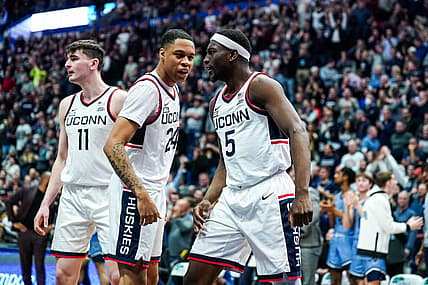 Dec 28, 2022; Hartford, Connecticut, USA; Connecticut Huskies guard Jordan Hawkins (24) and guard Hassan Diarra (5) react after a play against the Villanova Wildcats during the second half at XL Center. Mandatory Credit: David Butler II-USA TODAY Sports